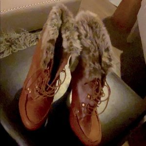 Brown high heeled boots with fur cuffs-